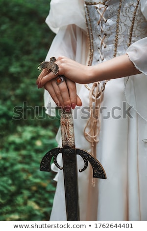 Stock foto: Warrior Woman Holding Sword In Her Hand