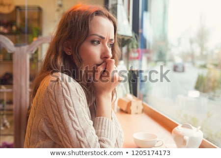 Stock photo: Shy Young Woman