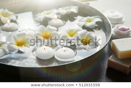 Stock photo: Aroma Bowl With Candles And Flowers