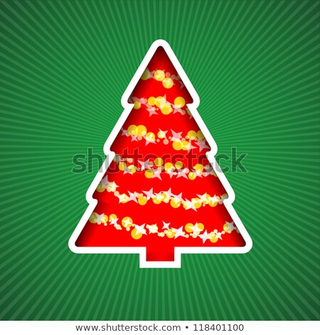Stock fotó: Cutting Green Card Into A Chain Of Christmas Trees
