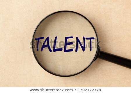 Stockfoto: Talent Development Magnifying Glass On Old Paper