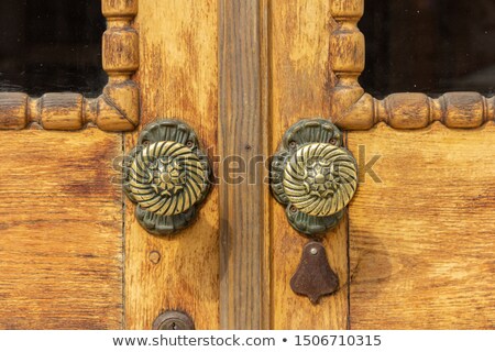 ストックフォト: Close Up Of Carved Golden Flowers On Church Door