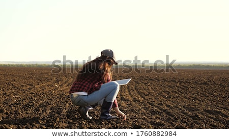 Stock fotó: Farmer Checking Soil Quality Of Fertile Agricultural Farm Land