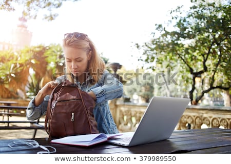 Stock fotó: Female Teenager Searching Something In Backpack