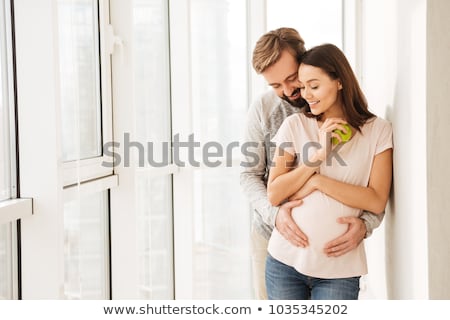 Stock photo: Smiling Pregnant Couple