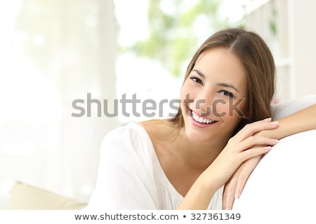 Foto stock: Woman With Healthy Smile At Dentist