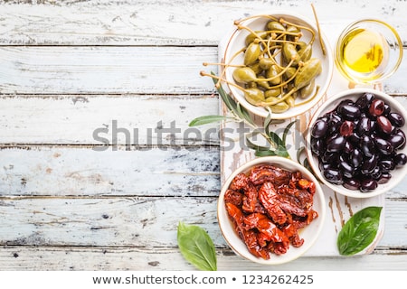 Stockfoto: Green And Black Olives With Capers And Caper Berries