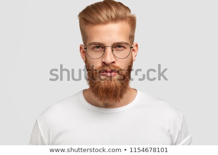 Foto stock: Caucasian Man Wearing White Shirt And Trendy Hairstyle