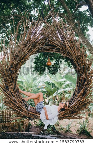 ストックフォト: Portrait Of A Blonde Relaxing In A Rainforest