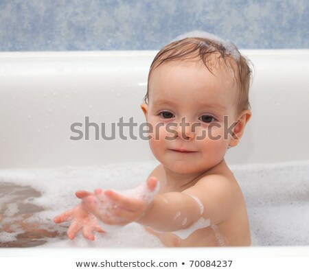 Stock photo: Adorable One Year Old Baby Playing With Foam In The Bathroom