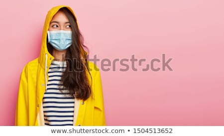 Stockfoto: Woman Wearing Hooded Coat