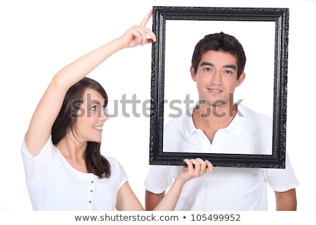 Stockfoto: Couple Holding Empty Picture Frame