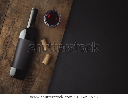 Stockfoto: Red Wine With Bottle And Glass On A Table