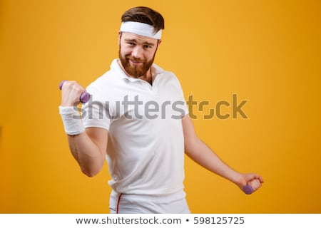 Foto stock: Funny Man With Dumbbells On White