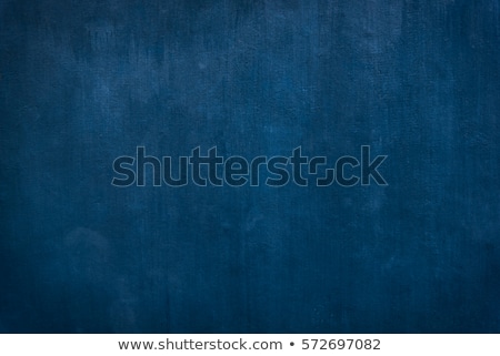 Foto stock: Worn Blue Paint Texture In Old Stone Wall