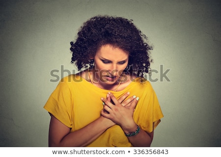 Foto stock: Sick Middle Aged Woman With Heart Attack Excruciating Sudden Pain