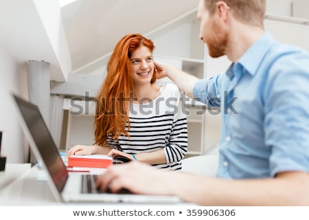 Stock foto: Man And Woman Flirting In The Office