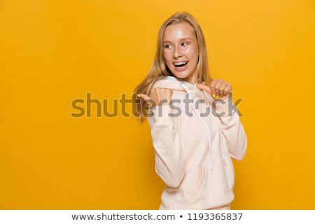 Stock photo: Photo Of Positive Girl 16 18 With Dental Braces Pointing Finger