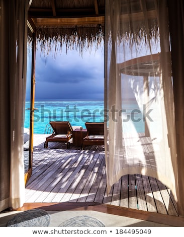 Stok fotoğraf: Wooden Bungalow On The Beach