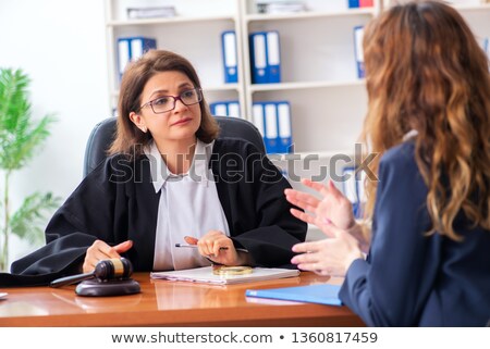 Foto d'archivio: Young Woman Visiting Female Lawyer