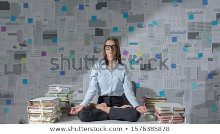 Stok fotoğraf: Barefoot Businesswoman In Office