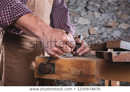 ストックフォト: Man Using Vice To Secure Wood