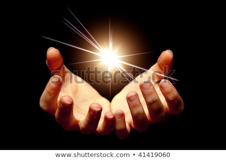 Stock foto: Female Hands Holding A Brilliant Shine In The Dark