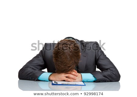 Foto d'archivio: Businessman Lies With Head On Desk