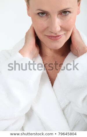 Stock fotó: Woman In Bath Robe With Hands Behind Neck