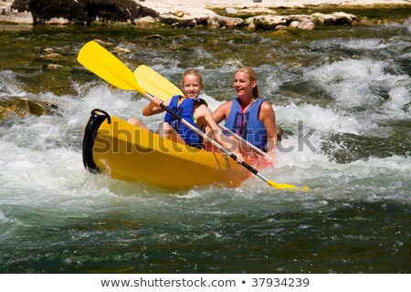 Foto d'archivio: Two People In Canoe Enjoying Holidays And Nice Weather