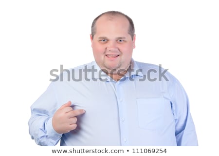 Stockfoto: Fat Man In A Blue Shirt Showing Obscene Gestures