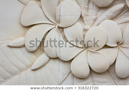 Stockfoto: Stone Lotus Flower Decoration On The Wall Of The Temple On Bali