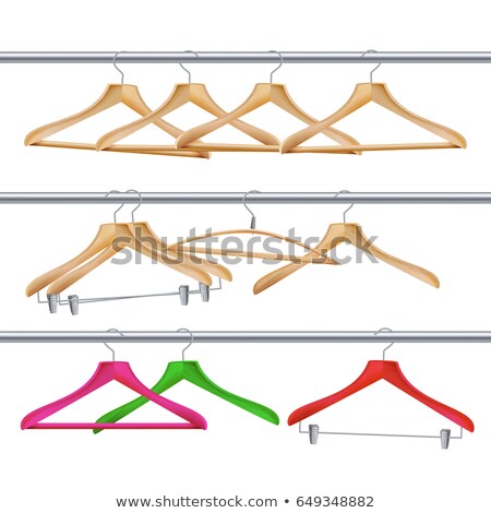Foto stock: Wooden Coat Hangers On The Tube For Wardrobe Clothes