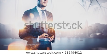 Stok fotoğraf: Double Exposure Of Business Man With Office Building