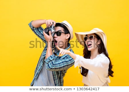 Stok fotoğraf: Travelling Couple Taking Photo Picture With Camera