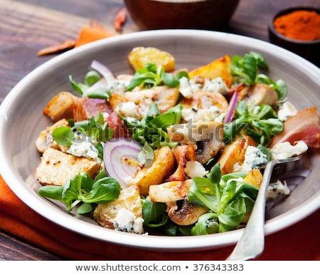 Stockfoto: Potato Salad With Bacon Mushroom On Orange Napkin