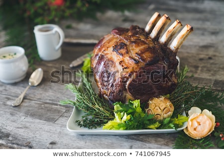ストックフォト: Roasted Ribs With Rosemary And Potatoes On Wooden Cutting Board