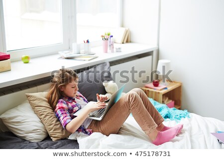 Bored Teenager In Bedroom Stockfoto © Pressmaster