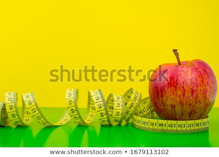 Zdjęcia stock: Apple And Measuring Tape On White