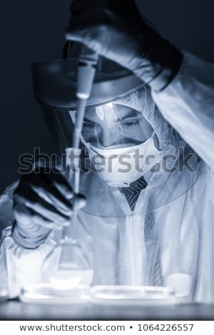 Stok fotoğraf: Working In The Laboratory With A High Degree Of Protection