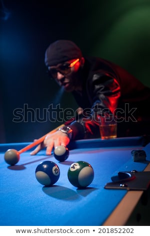 Stock photo: Trendy Pool Player In A Leather Jacket