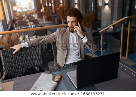 Foto stock: Handsome Young Casual Man Holding His Girlfrined