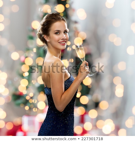 Foto stock: Happy Beautiful Woman Holding Glass Of Champagne