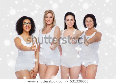 Stok fotoğraf: Plus Size Woman In Underwear Showing Thumbs Up