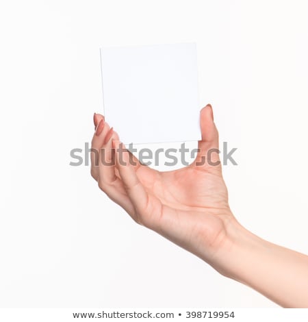 ストックフォト: Female Hand Holding Blank Paper For Records On White