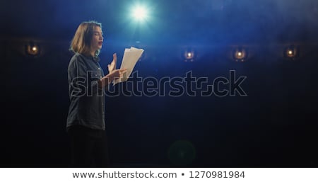 ストックフォト: Actress Reading Her Scripts On Stage In Theatre