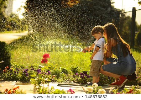 [[stock_photo]]: Mother And Son In Shower