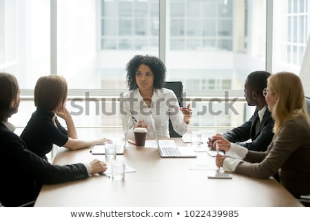 Stok fotoğraf: Businessman And Woman In Conversation