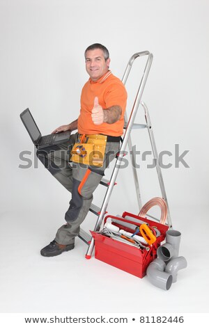 Stock photo: Grey Haired Artisan With Laptop Computer
