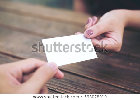 Stockfoto: Businesswomans Hand Holding Blank Business Card